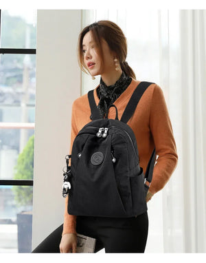 Mochila De tela de nailon impermeable para mujer, morral escolar de moda para chicas adolescentes, bolso de hombro de alta calidad, mochila de viaje, novedad de 2025