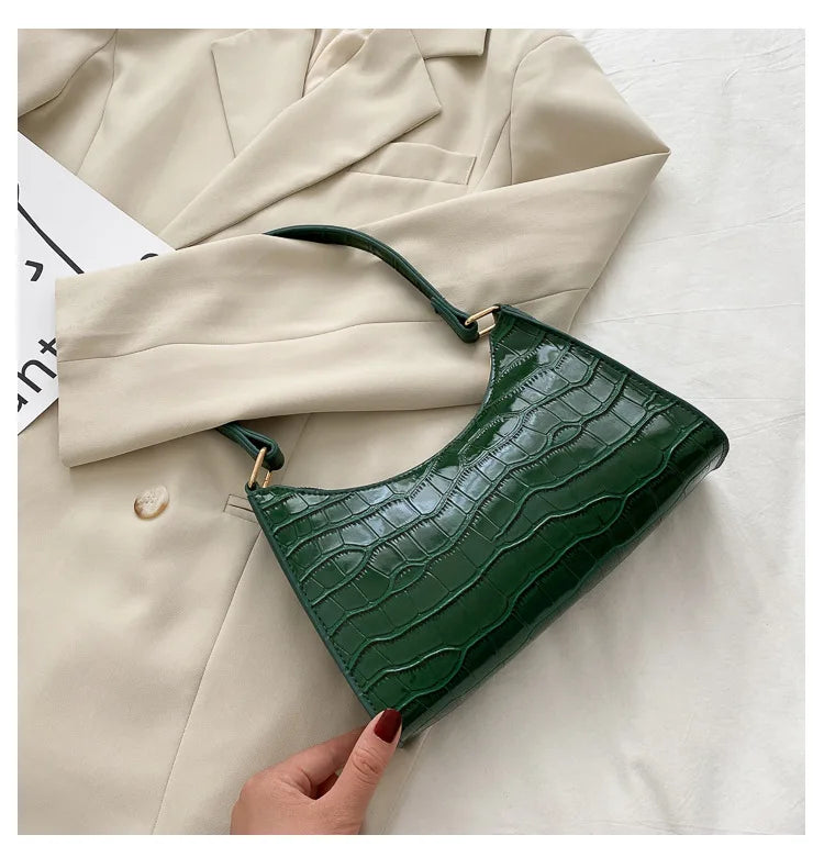 Bolso de compras exquisito de moda para mujer, bolsos de hombro Retro informales, bolso de mano con cadena de cuero de Color sólido