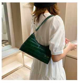 Bolso de compras exquisito de moda para mujer, bolsos de hombro Retro informales, bolso de mano con cadena de cuero de Color sólido