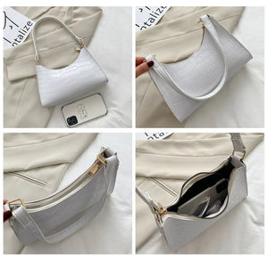 Bolso de compras exquisito de moda para mujer, bolsos de hombro Retro informales, bolso de mano con cadena de cuero de Color sólido