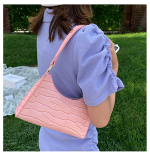 Bolso de compras exquisito de moda para mujer, bolsos de hombro Retro informales, bolso de mano con cadena de cuero de Color sólido