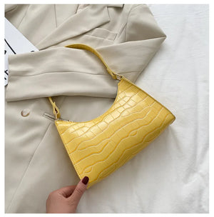 Bolso de compras exquisito de moda para mujer, bolsos de hombro Retro informales, bolso de mano con cadena de cuero de Color sólido